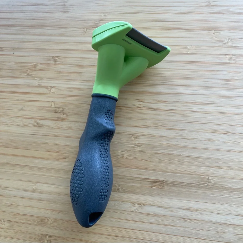 FURminator Green and Black Dog Grooming Tool